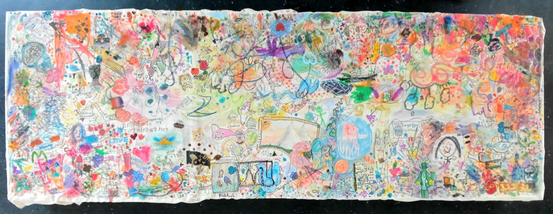 The Day 2 collaborative canvas densely layered with colourful drawings, paint, patterns, figures, and shared marks.
